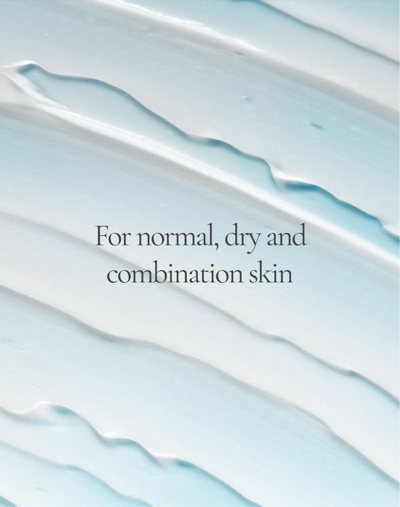 Model applying Isa Knox LXNEW Clean Nourishing Cream Cleanser