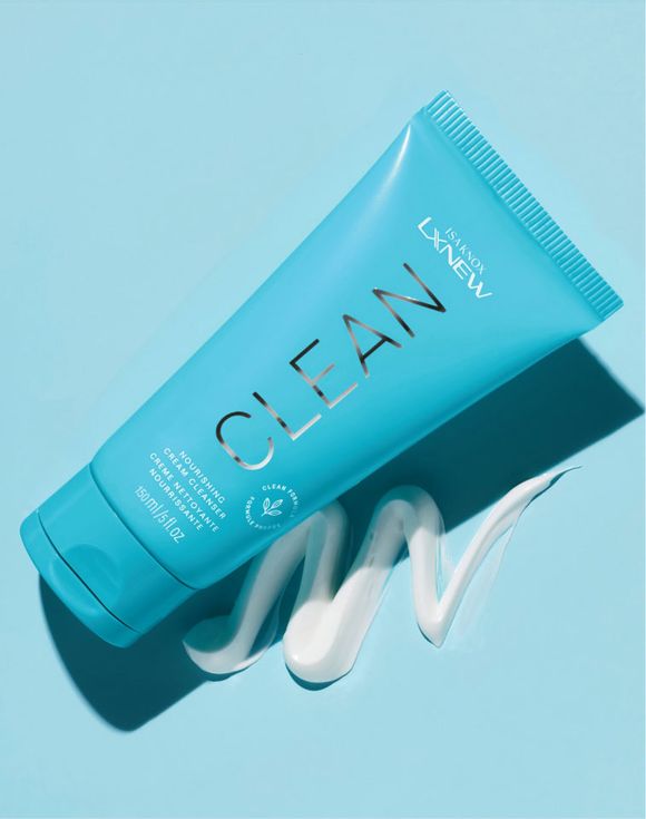 Isa Knox LXNEW Clean Nourishing Cream Cleanser with cream texture on teal background