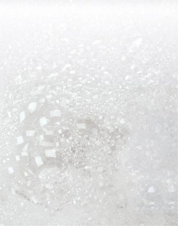 Senses Aquatic Breeze Bubble Bath and Body Scrub set in turquoise water with seashells and starfish
