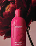 Organist Volumizing Shampoo bottle with camellia flower background