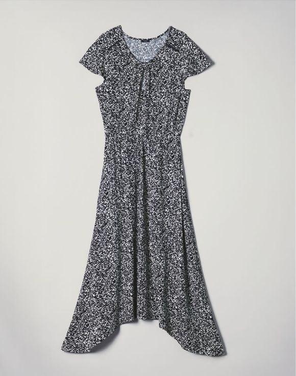 Patterned Dress – close-up of keyhole neckline and flutter sleeve detail on model