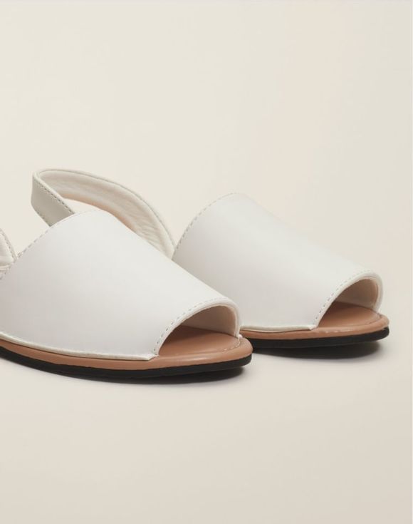 Island Sandal – top-down view of pair showing footbed and Studio Jaug branding