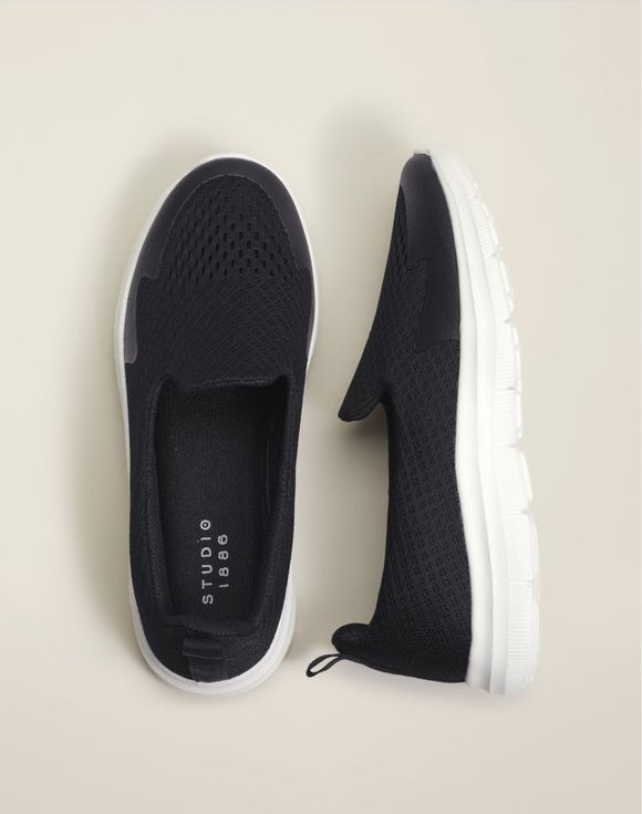 Sporty Mesh Sneaker on foot with socks