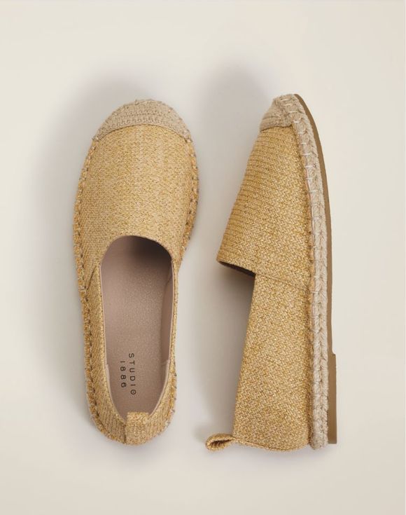 Pair of metallic gold espadrilles top and side view