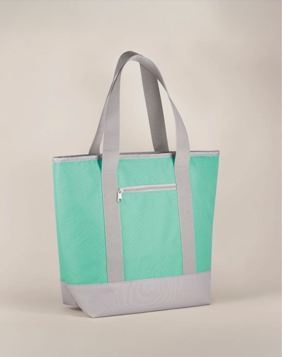 Multi-Use Cooler Bag - model carrying mint green tote on shoulder