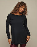 Rib-Knit Tunic - model wearing black tunic with arms raised