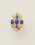 Royal Blue Crown Statement Ring top view showing full ornate gold-tone setting with blue cabochon stones