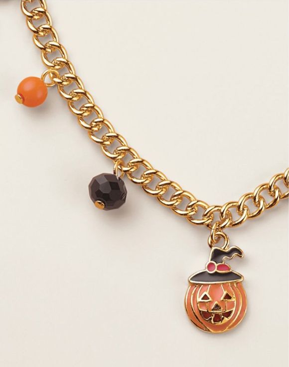 Charmed and Spooked Necklace jack-o-lantern charm close-up