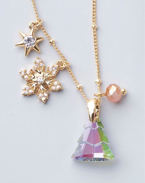 Northern Star Holiday Charm Necklace – close-up detail of crystal tree and star charms