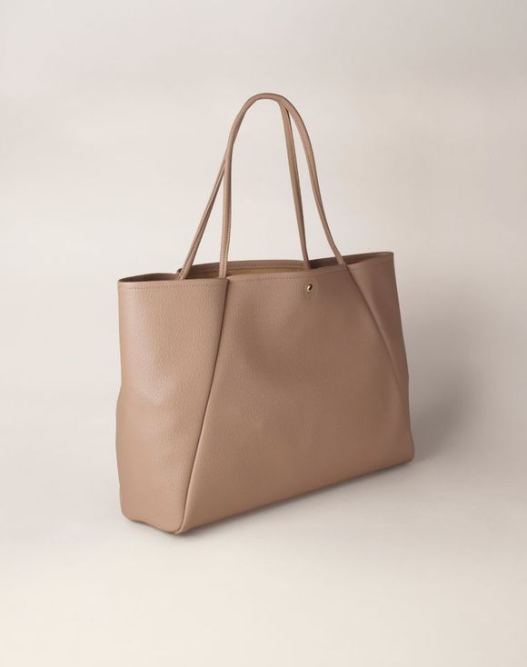 Soft Tote Bag – angled side view showing pebbled texture and dual handles