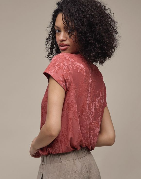 Two-Pack Textured Tops model wearing terracotta top back view