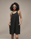Tank Dress – model wearing black tank dress, front view with sunglasses