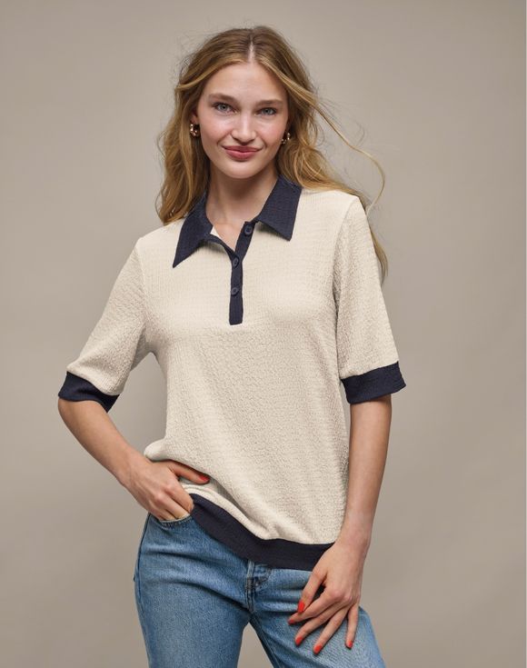 Two-Tone Top - model wearing cream polo top with navy contrast collar and cuffs