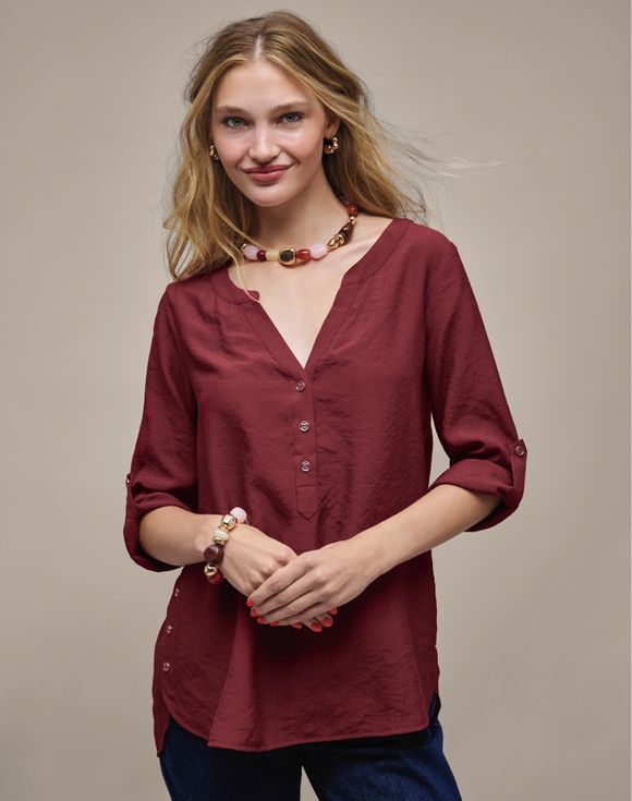 Button Detail Top - model front view showing split V-neckline and partial button placket