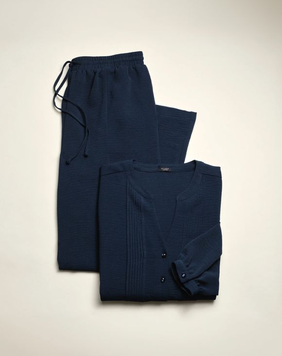 Relaxed Two-Piece Set - blouse and pants laid out together