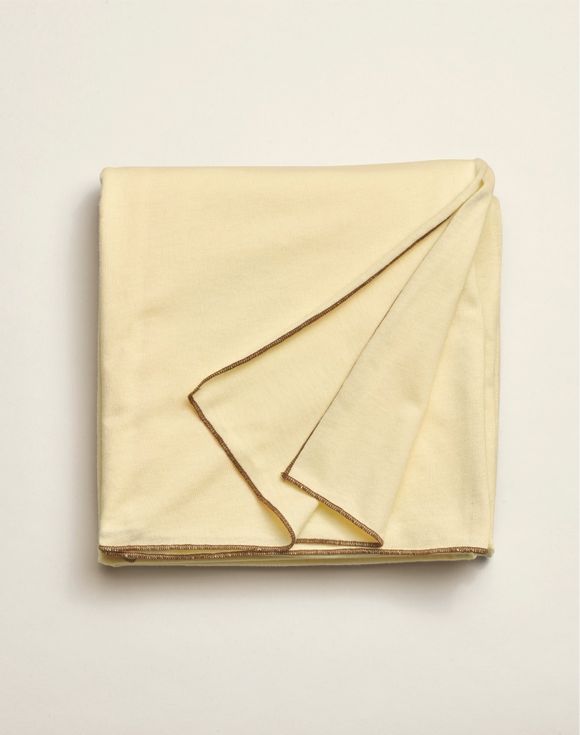 Two-Pack Knit Scarves - cream scarf folded showing gold overlock edge stitching