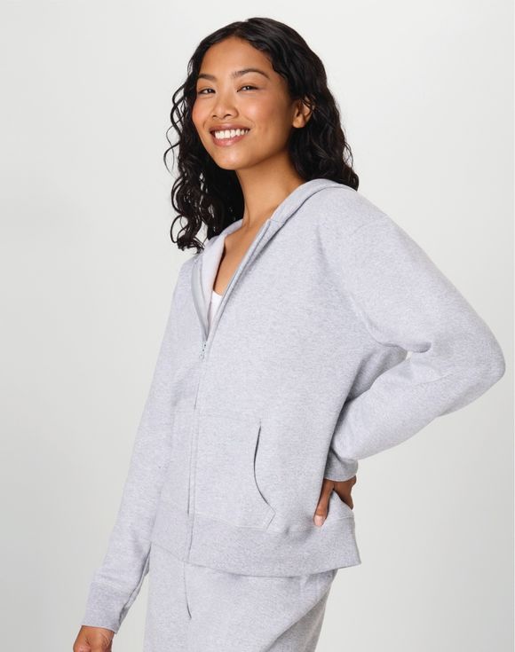 Hanes EcoSmart Full-Zip Fleece Hoodie light steel heather side view model smiling